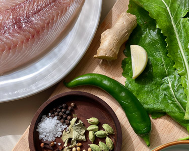 poisson à la cardamome